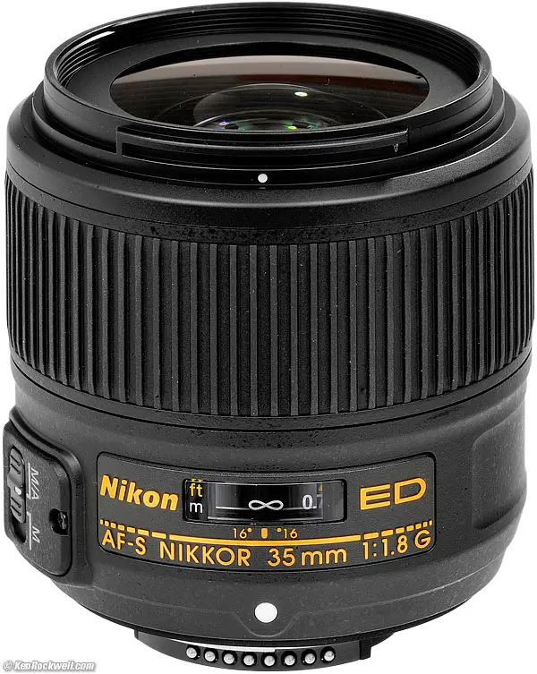 black nikon nikkor lense with white background