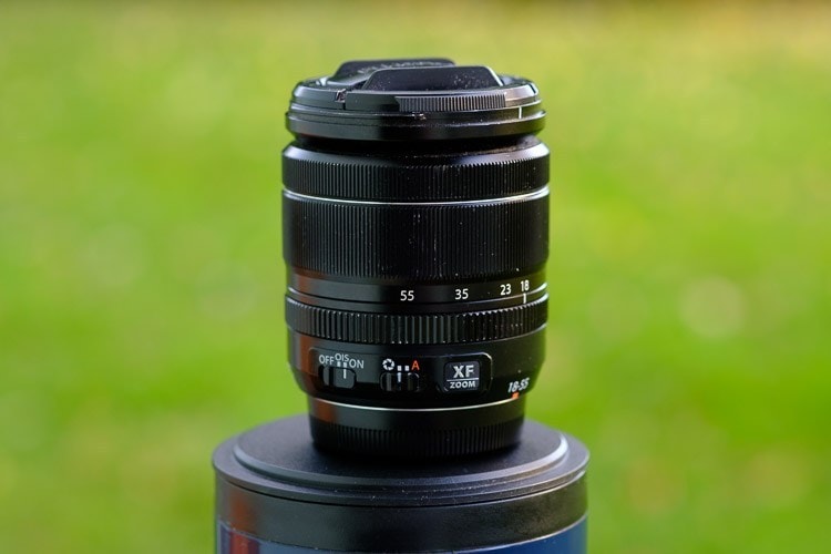 black lens in a green grass background