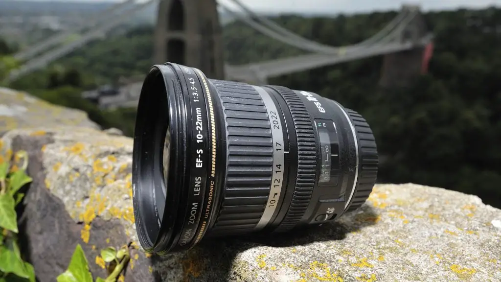 black canon lens on the rock surface