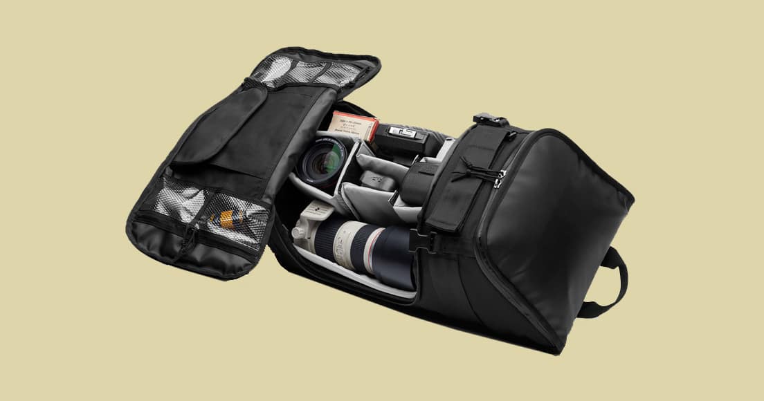 Chrome niko backpack with camera, lenses, and accessories