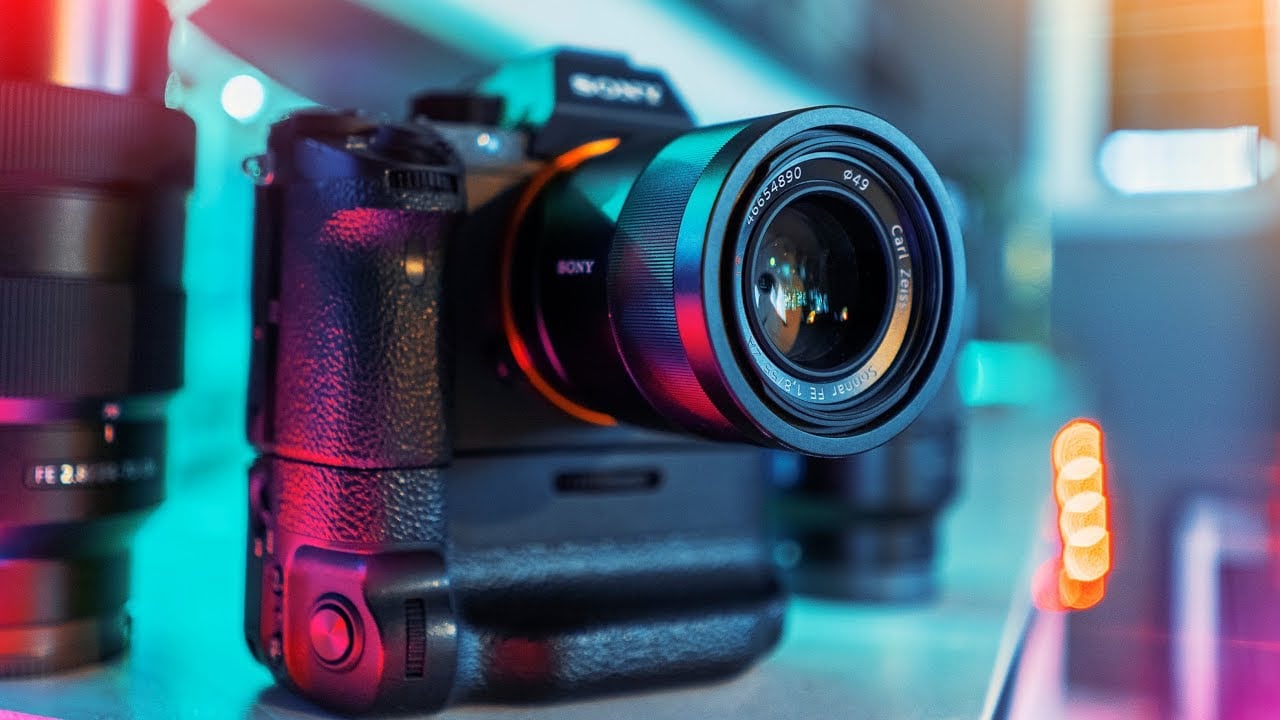 a camera with neon lights colors design