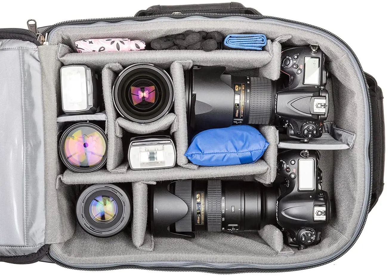 Camera and accessories compartmentalize by pads inside the camera bag.