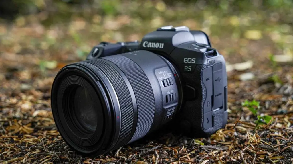 An image of a Canon camera on the ground