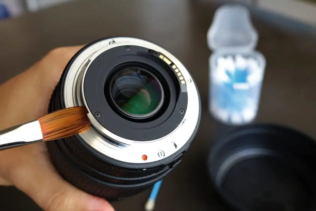 Proper cleaning of the lens with a brush