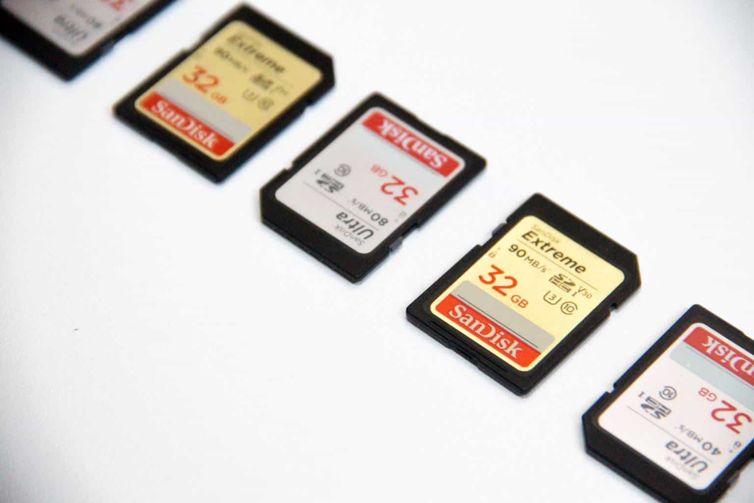 memory cards aligned in a white surface