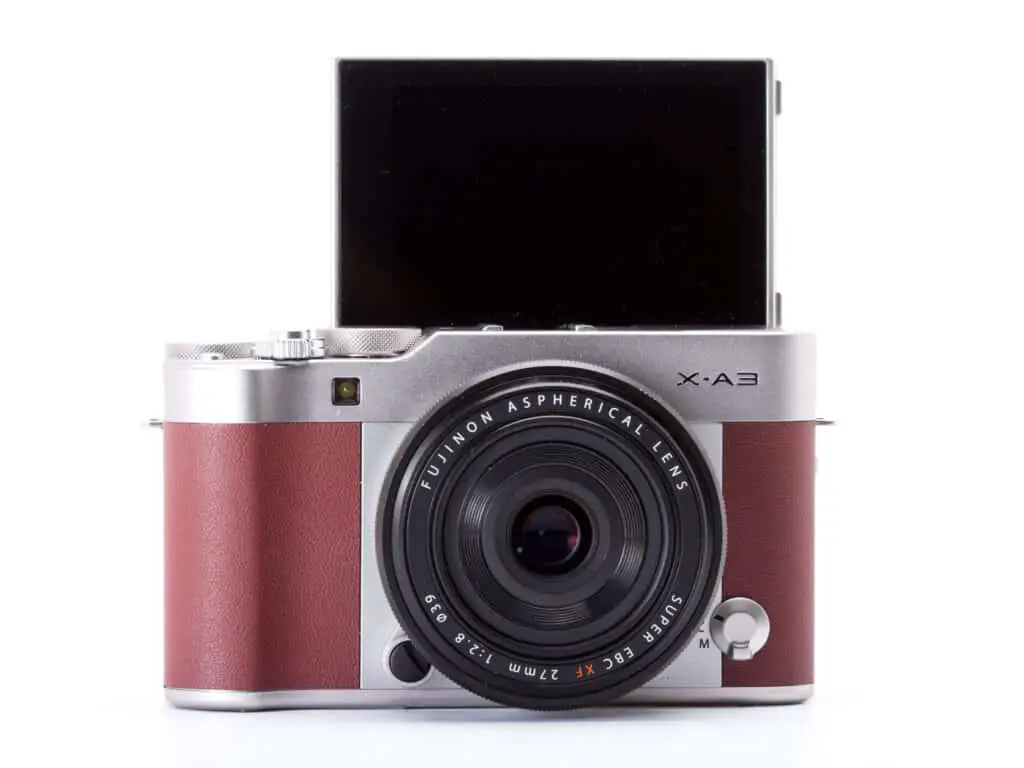brown Fujifilm X-A3 camera with white background