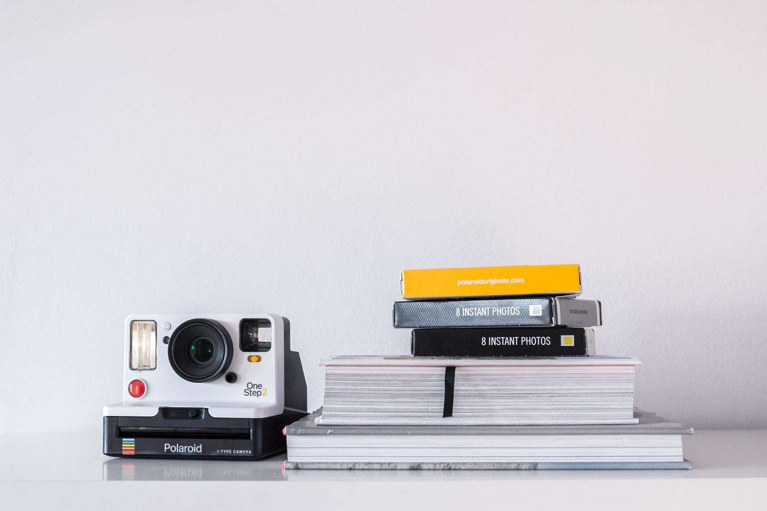 polaroid snap on table
