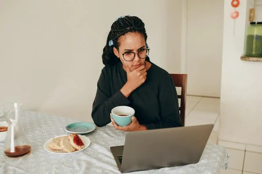 An image of a woman thinking to edit photo