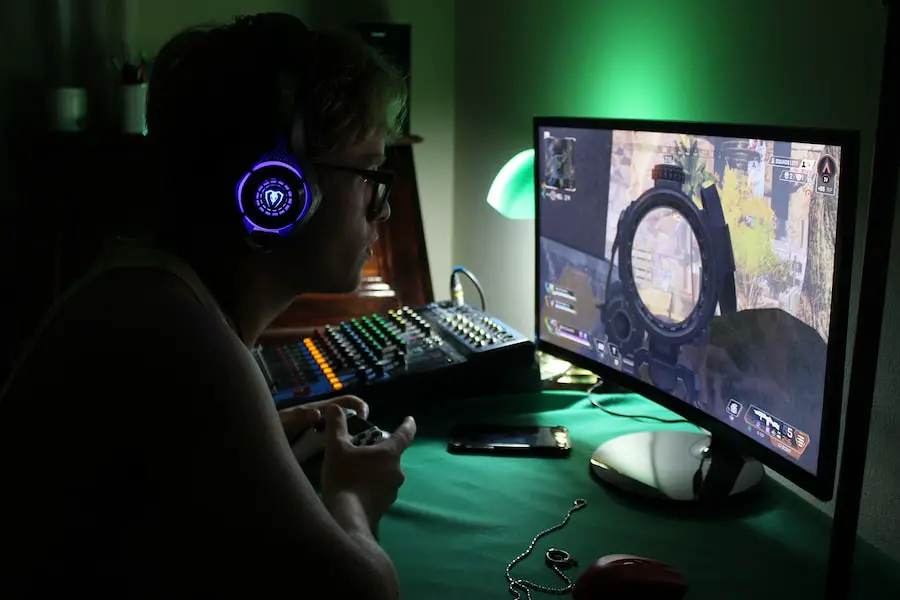 An image of a man playing on PC