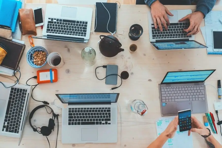 An image of laptops on the table