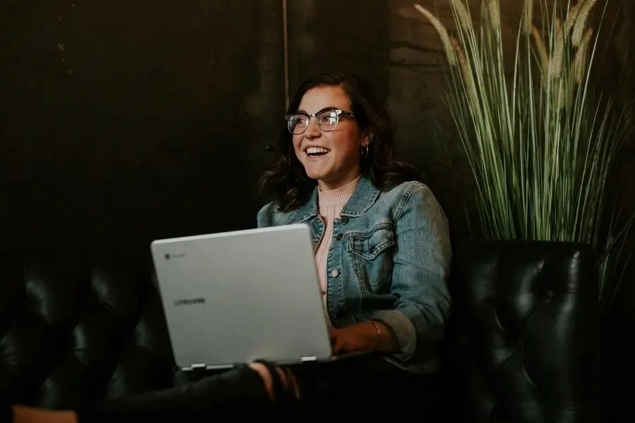 An image of a woman using her laptop